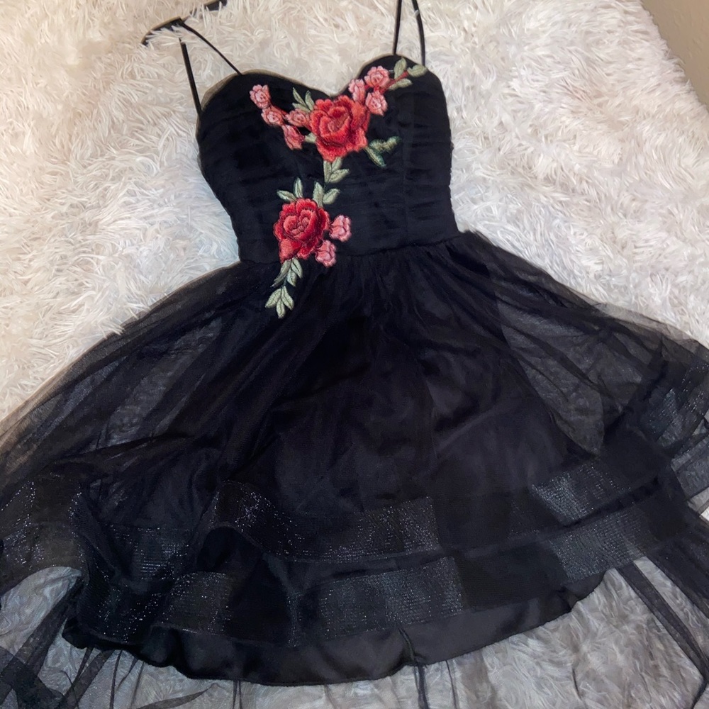 A black Hi-low dress with red rose embroidery